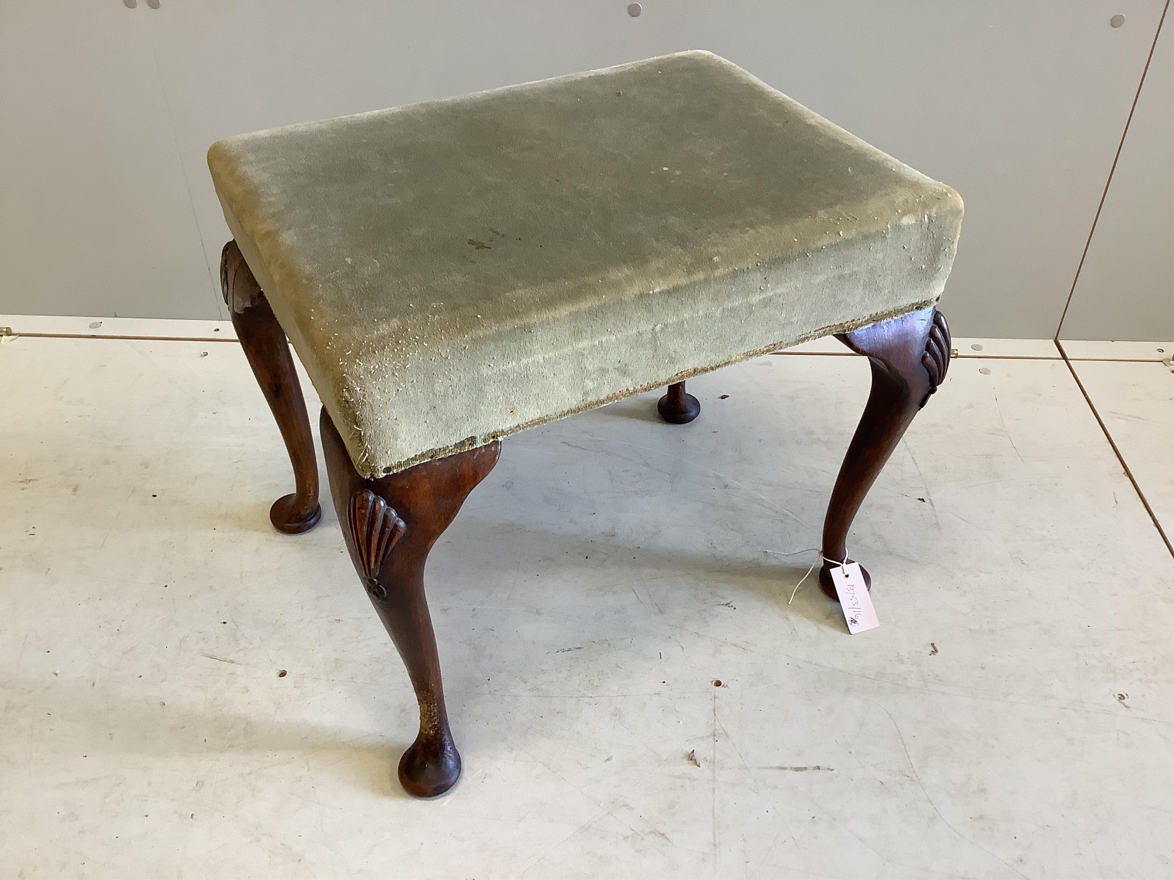 A Queen Anne Revival walnut stool on shell carved cabriole legs, width 54cm, depth 42cm, height 47cm. Condition - fair